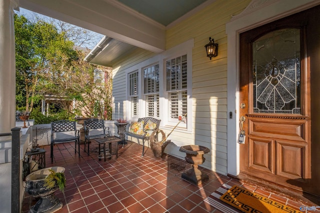 view of patio featuring covered porch