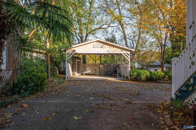 view of car parking with a carport