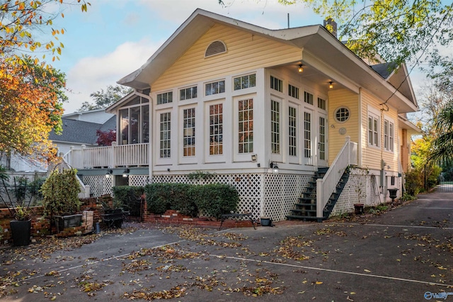 exterior space featuring a sunroom