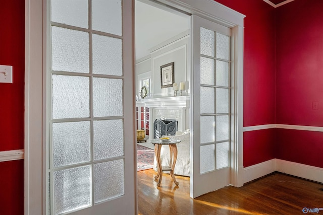 doorway to outside featuring hardwood / wood-style floors