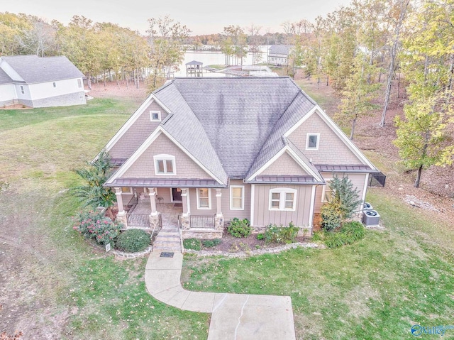 view of front facade featuring a yard and a porch