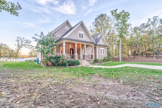 craftsman inspired home featuring covered porch