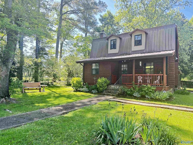 101 9th St W, Grant, AL 35747 - view of front of property featuring covered porch, a front yard, and metal roof