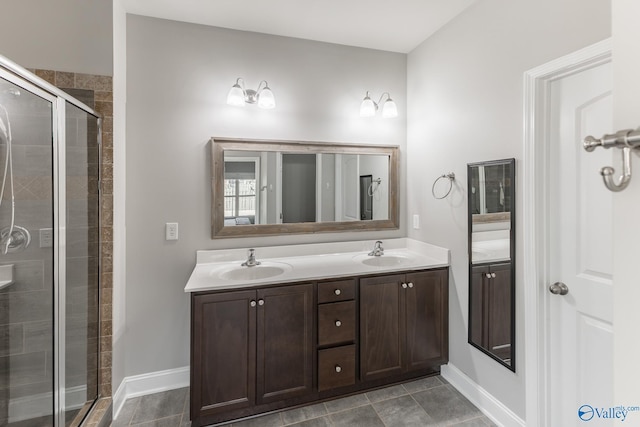 bathroom with vanity and an enclosed shower