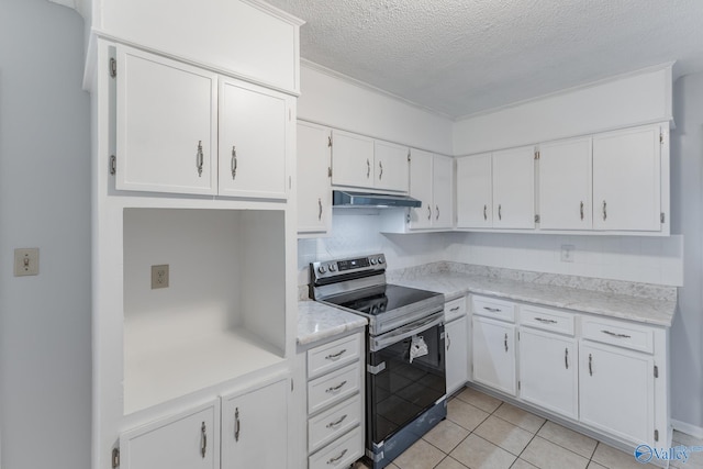 kitchen with electric stove, white cabinets, a textured ceiling, and light tile patterned floors