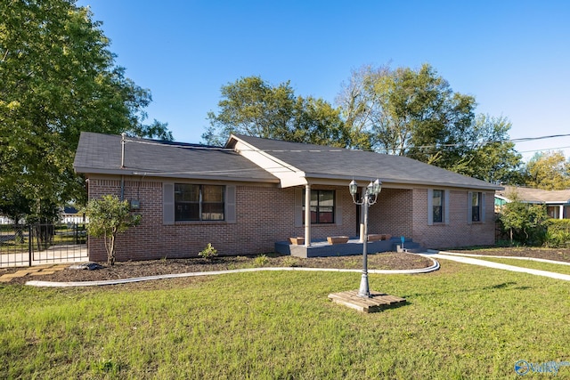 single story home with a front yard