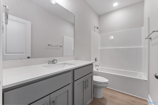 162 River Pointe Dr, New Market, AL 35761 - full bath with vanity, toilet, wood finished floors, and shower / bath combination