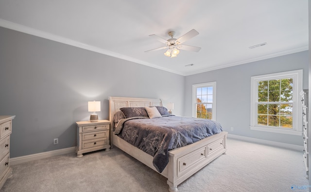 bedroom with crown molding, baseboards, and light colored carpet