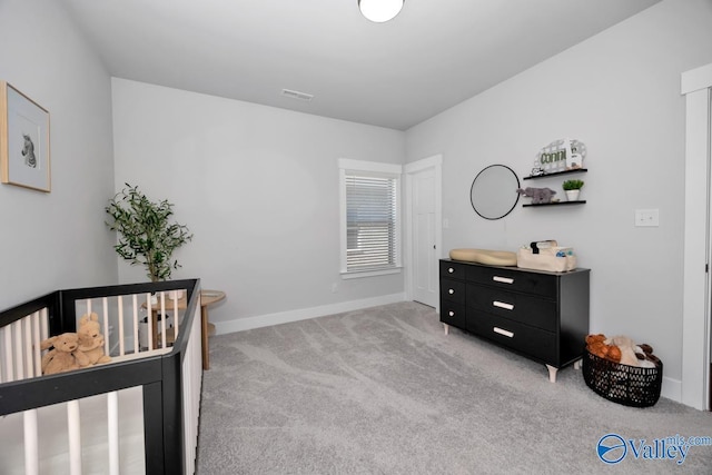 bedroom with light colored carpet