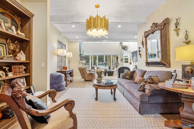 living room featuring an inviting chandelier and light wood-type flooring