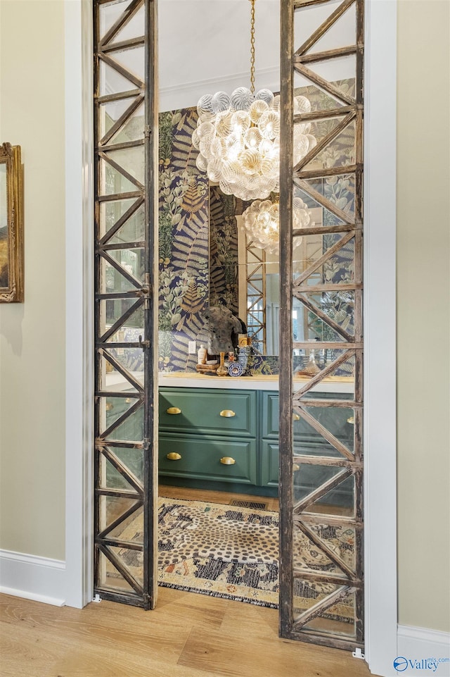 wine cellar with light wood-type flooring