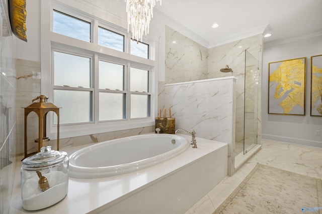 bathroom featuring tile patterned floors, tile walls, a chandelier, ornamental molding, and separate shower and tub