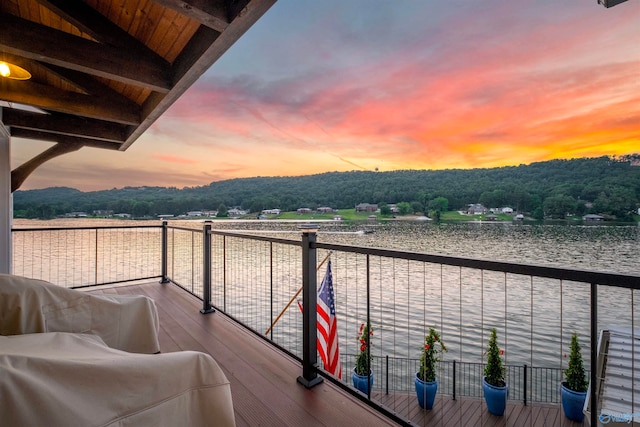 view of balcony at dusk