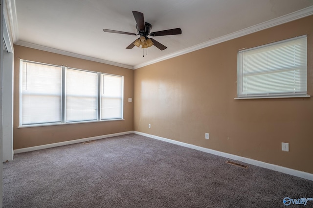 carpeted empty room featuring ceiling fan and ornamental molding