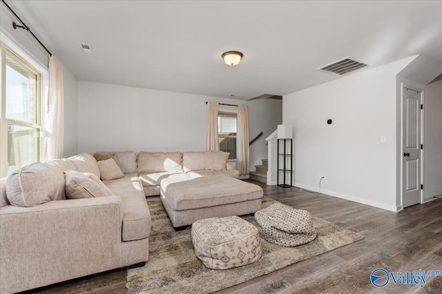 living room with dark hardwood / wood-style floors