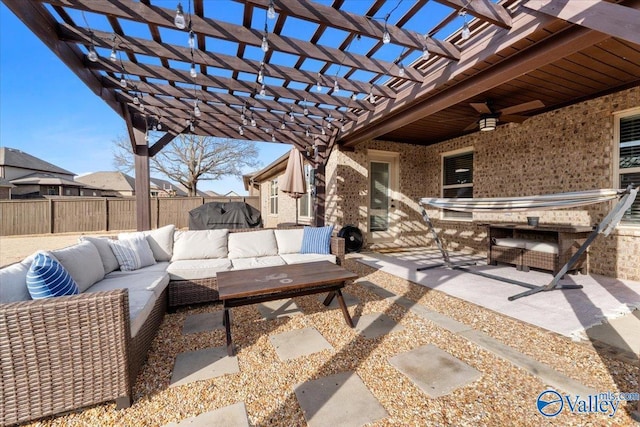 view of patio with a pergola and outdoor lounge area