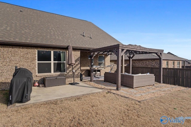 back of house with outdoor lounge area, a yard, a patio, and a pergola