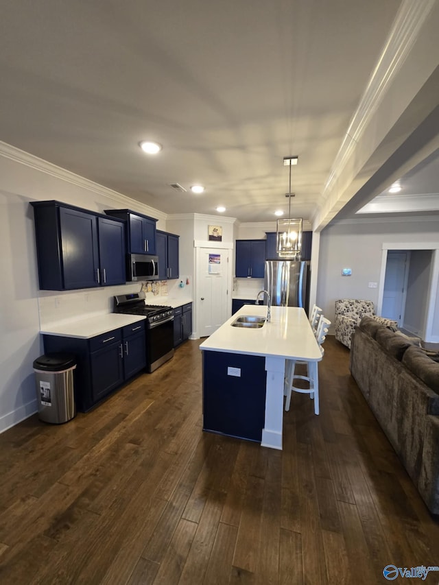 kitchen with a kitchen breakfast bar, appliances with stainless steel finishes, open floor plan, and dark wood-style flooring