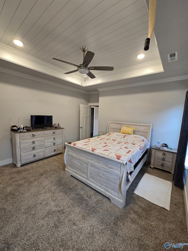 carpeted bedroom featuring a tray ceiling, wood ceiling, visible vents, and ornamental molding