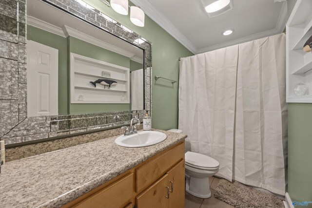 199 Ford Chapel Dr, Harvest, AL 35749 - bathroom with ornamental molding, toilet, vanity, and tile patterned floors
