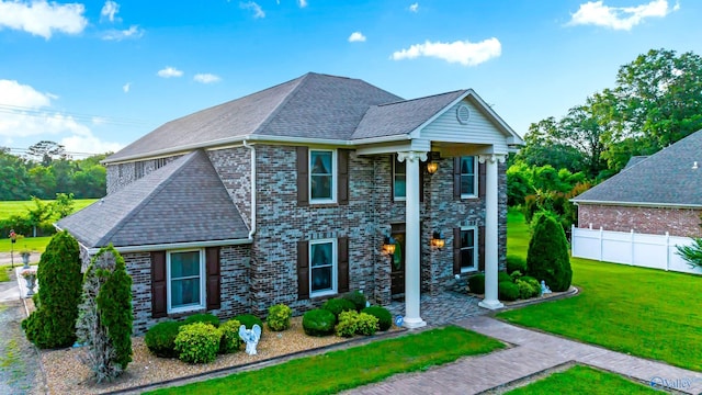 view of front of home with a front yard