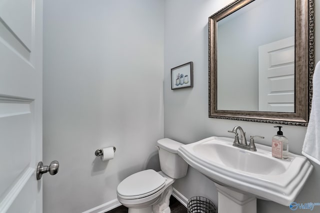162 Saddle St, New Market, AL 35761 - bathroom with a sink, baseboards, and toilet