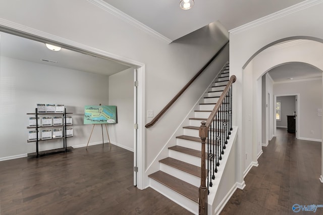 162 Saddle St, New Market, AL 35761 - stairs featuring ornamental molding, arched walkways, baseboards, and wood finished floors