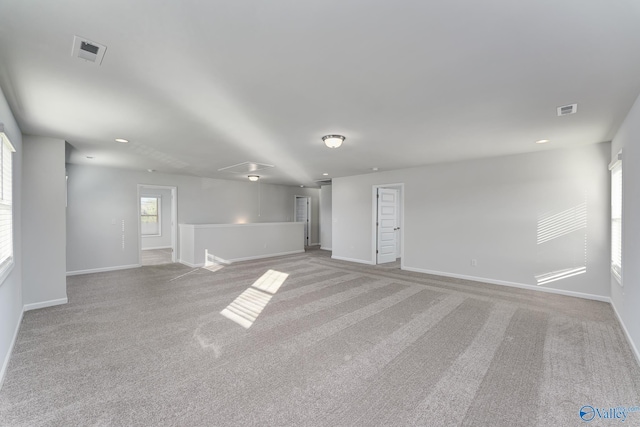 162 Saddle St, New Market, AL 35761 - carpeted empty room with baseboards, attic access, and visible vents