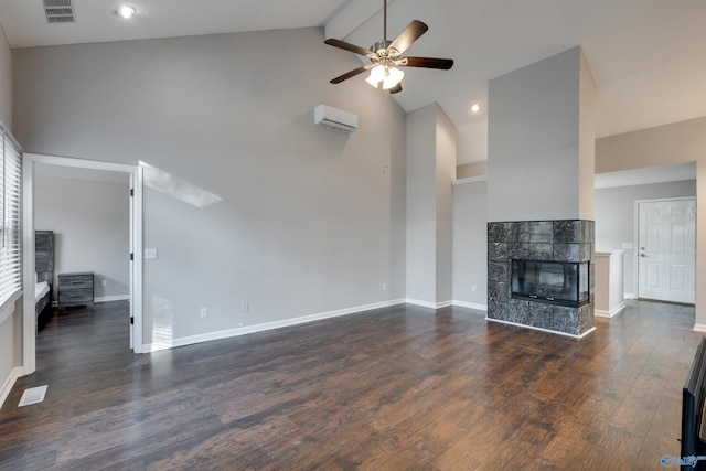 unfurnished living room with beam ceiling, a tile fireplace, dark hardwood / wood-style flooring, and high vaulted ceiling