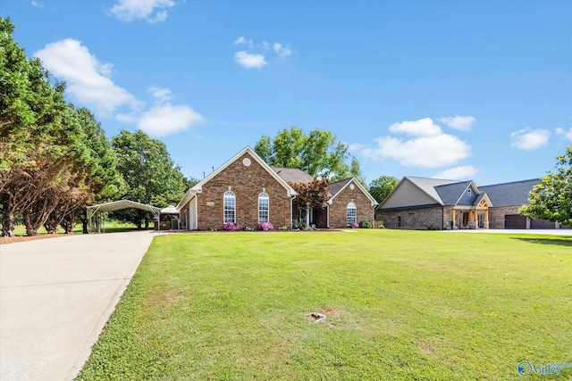 view of property with a front yard and a carport