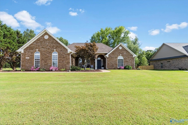 view of front of property with a front lawn