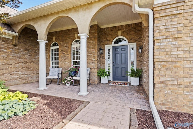 doorway to property with a porch