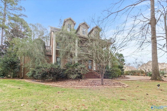 exterior space featuring a lawn