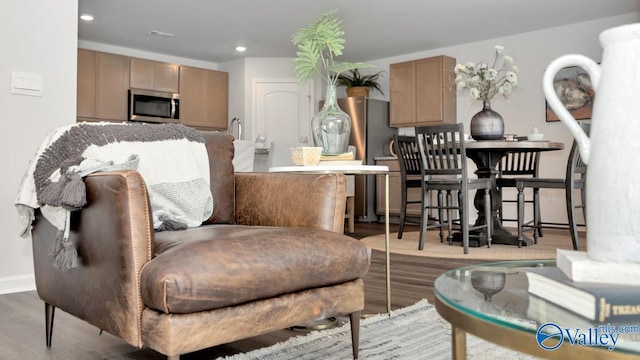 living room with hardwood / wood-style floors