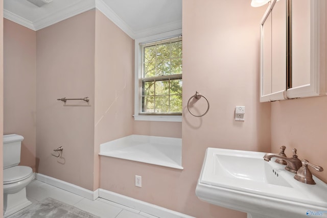 bathroom featuring toilet, crown molding, sink, and tile patterned flooring