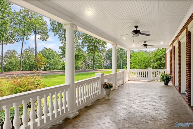 view of patio with ceiling fan and a porch