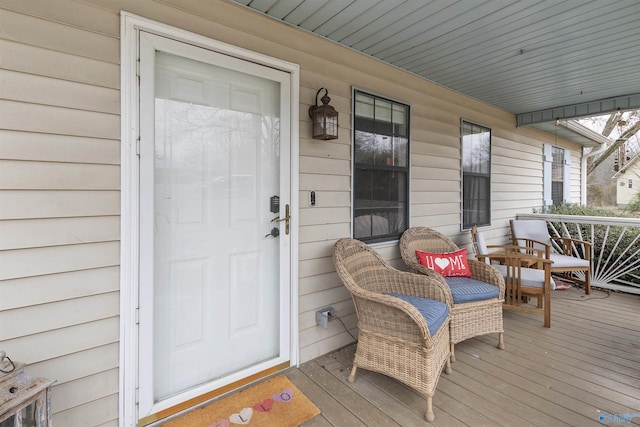 doorway to property with a porch