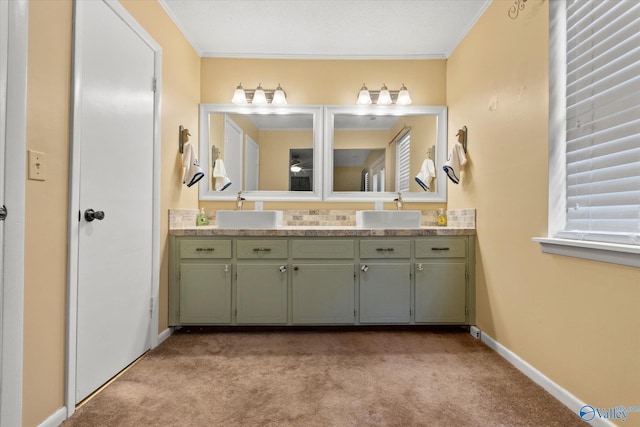 full bath featuring carpet floors, double vanity, and a sink