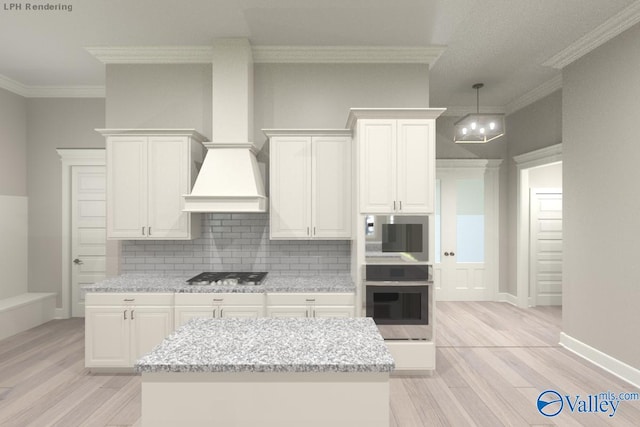 kitchen with light stone countertops, appliances with stainless steel finishes, ornamental molding, and white cabinets