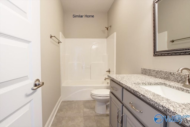 full bathroom featuring toilet, tile patterned floors, shower / washtub combination, and vanity