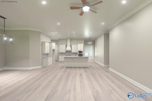 kitchen featuring crown molding, hanging light fixtures, light wood-type flooring, custom range hood, and white cabinets