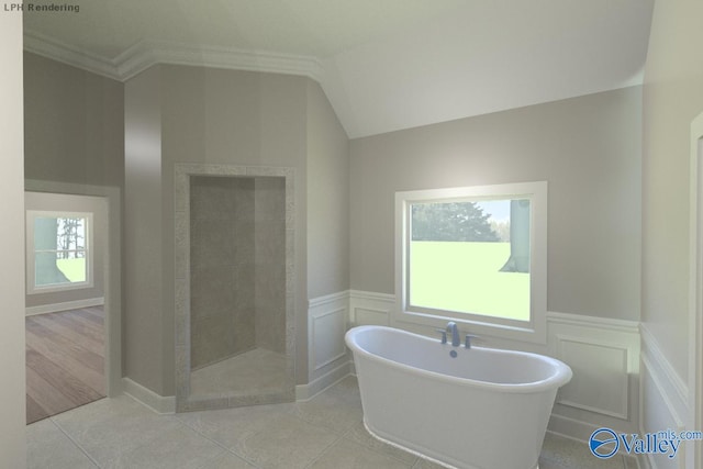 bathroom featuring lofted ceiling, ornamental molding, separate shower and tub, and tile patterned flooring