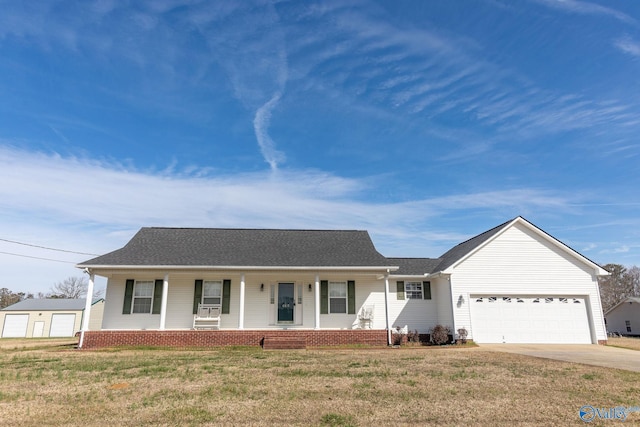 single story home with driveway, covered porch, a garage, and a front lawn