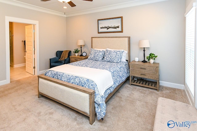 bedroom with multiple windows, carpet floors, baseboards, and ornamental molding