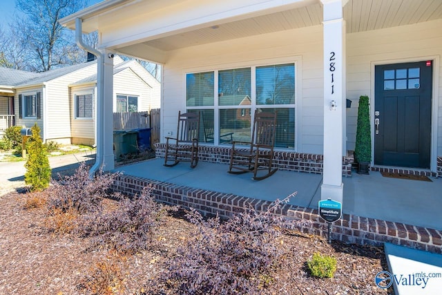 doorway to property with covered porch