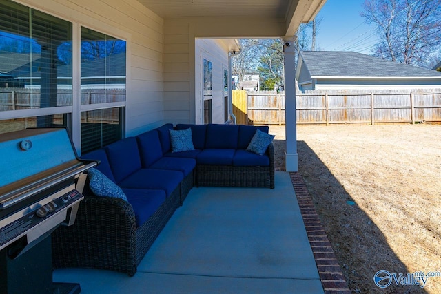 view of patio featuring an outdoor hangout area and fence