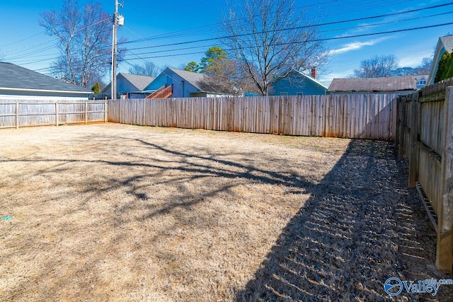 view of yard featuring a fenced backyard