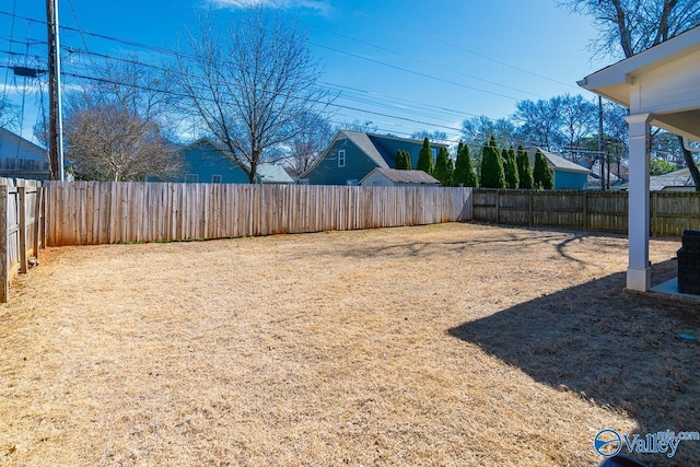 view of yard featuring a fenced backyard