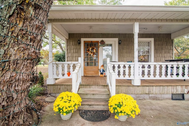 entrance to property with a porch