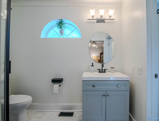 bathroom with marble finish floor, visible vents, toilet, vanity, and baseboards